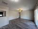 Updated living room offers new floors, new ceiling fan and access to the kitchen at 8115 N 56Th Ave, Glendale, AZ 85302