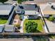 Aerial view of a property highlighting the backyard, patio, shed, and green space at 830 E Orchid Ln, Phoenix, AZ 85020