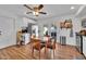 Bright kitchen with a dining area, stainless steel appliances, and direct access to an outdoor patio space at 830 E Orchid Ln, Phoenix, AZ 85020