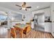 Eat-in kitchen features stainless steel appliances and a dining table perfect for casual meals and entertaining at 830 E Orchid Ln, Phoenix, AZ 85020