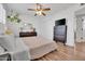 Spacious bedroom featuring white walls, ceiling fan, and lots of natural light at 830 E Orchid Ln, Phoenix, AZ 85020