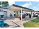 Covered patio space featuring string lights and outdoor seating at 830 E Orchid Ln, Phoenix, AZ 85020