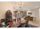 Lovely dining area with chandelier with easy access to living room at 9270 E Thompson Peak Pkwy # 367, Scottsdale, AZ 85255