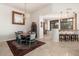 Open dining area with chandelier and easy access to kitchen and bar at 9270 E Thompson Peak Pkwy # 367, Scottsdale, AZ 85255