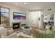 Well-lit living room with cozy fireplace and tile floors at 9270 E Thompson Peak Pkwy # 367, Scottsdale, AZ 85255