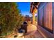 Outdoor patio features a built-in grill and lush landscaping for enjoyable outdoor living at 9270 E Thompson Peak Pkwy # 367, Scottsdale, AZ 85255