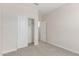 This bedroom features neutral walls, carpeted floors, and a closet at 10229 N 49Th Dr, Glendale, AZ 85302