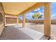 Covered patio perfect for outdoor dining and entertaining with backyard landscaping at 1176 N 169Th Ave, Goodyear, AZ 85338