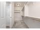 Spacious walk-in closet with built-in shelving and ample storage space at 1176 N 169Th Ave, Goodyear, AZ 85338