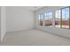 Bright bedroom with neutral carpet, large windows offering plenty of natural light at 12327 W Luxton Ln, Avondale, AZ 85323