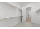 Walk-in closet with carpet floors, ample shelving, and convenient access to the bedroom at 12327 W Luxton Ln, Avondale, AZ 85323