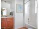 Bright bathroom features a combination shower and tub and single sink vanity at 14850 E Grandview Dr # 204, Fountain Hills, AZ 85268