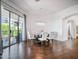 Bright and airy dining room with a modern chandelier and sliding doors leading to a balcony at 14850 E Grandview Dr # 204, Fountain Hills, AZ 85268