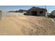 New home construction with block fence in a large backyard of a new development community at 2328 E Spur Dr, San Tan Valley, AZ 85140