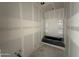 Bathroom featuring a black bathtub with white tile and modern fixtures at 2328 E Spur Dr, San Tan Valley, AZ 85140