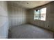 Bright bedroom with a large window offering plenty of natural light at 2328 E Spur Dr, San Tan Valley, AZ 85140