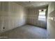 Well-lit bedroom with a window providing ample natural light at 2328 E Spur Dr, San Tan Valley, AZ 85140