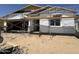 Unfinished single-story home with scaffolding and a front-facing garage at 2328 E Spur Dr, San Tan Valley, AZ 85140