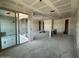 Spacious living room featuring drywall, sliding glass doors and open layout at 2328 E Spur Dr, San Tan Valley, AZ 85140
