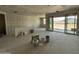Spacious living room featuring drywall and sliding glass doors leading to the outdoor area at 2328 E Spur Dr, San Tan Valley, AZ 85140