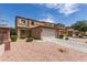 A charming two-story home with desert landscaping at 2565 E Southern Ave # 130, Mesa, AZ 85204