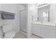 Clean bathroom with shower, toilet, vanity, and white cabinets at 2821 E Pontiac Dr, Phoenix, AZ 85050