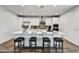 Spacious kitchen island with seating, perfect for casual dining and entertaining guests at 31345 N 130Th Ave, Peoria, AZ 85383