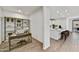 Home office space with desk, shelving, and easy access to the adjacent kitchen at 31345 N 130Th Ave, Peoria, AZ 85383