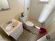 Modest bathroom with basic fixtures at 3155 E Mobile Ln, Phoenix, AZ 85040