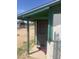 View of the home's entryway with security door and small porch at 3155 E Mobile Ln, Phoenix, AZ 85040