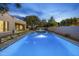 Outdoor living area featuring a pool with fountains, spa, and a cozy fire pit for entertaining at 4300 S Marble St, Gilbert, AZ 85297
