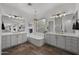 Luxurious bathroom featuring double vanities, soaking tub and designer fixtures at 4300 S Marble St, Gilbert, AZ 85297