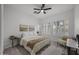 Serene bedroom with shutters, neutral decor, and stylish furnishings at 4300 S Marble St, Gilbert, AZ 85297