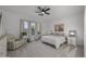 Bright main bedroom with neutral decor, natural light, and pool view at 4300 S Marble St, Gilbert, AZ 85297