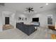 Spacious living room with grey sectional sofa and stylish decor at 4300 S Marble St, Gilbert, AZ 85297