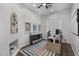 Well-lit office space with modern decor, neutral walls, and a ceiling fan at 4300 S Marble St, Gilbert, AZ 85297