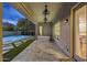 Covered patio showing fountain pool, modern tub and travertine tile at 4300 S Marble St, Gilbert, AZ 85297