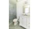 This pristine bathroom offers a glass shower and classic marble vanity at 5328 E Yale St, Phoenix, AZ 85008