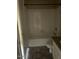 This bathroom has a shower and tub combo with white tile at 653 W Guadalupe Rd # 2019, Mesa, AZ 85210