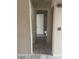A hallway view of a bathroom with tile flooring at 653 W Guadalupe Rd # 2019, Mesa, AZ 85210