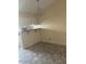 A view of the living room showing tile flooring and an adjacent breakfast bar at 653 W Guadalupe Rd # 2019, Mesa, AZ 85210