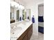Bathroom features a double sink vanity with plentiful counter space at 7537 W Bluefield Ave, Glendale, AZ 85308