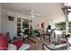 Cozy covered patio with ceiling fans and comfortable outdoor furniture at 7537 W Bluefield Ave, Glendale, AZ 85308