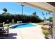 Sparkling pool in a spacious backyard with manicured landscaping at 7537 W Bluefield Ave, Glendale, AZ 85308
