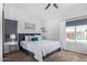 Comfortable bedroom with bright natural light, a large bed, and access to the pool area at 960 W Hudson Way, Gilbert, AZ 85233