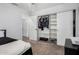 Cozy bedroom featuring a closet with sliding doors and ample storage space for clothes and personal items at 960 W Hudson Way, Gilbert, AZ 85233