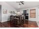 Comfortable dining area features stylish furnishings, a high ceiling and hardwood floors at 960 W Hudson Way, Gilbert, AZ 85233