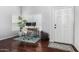 Inviting entryway featuring a desk space near a bright window and beautiful hardwood floors at 960 W Hudson Way, Gilbert, AZ 85233