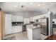 Bright kitchen featuring white cabinets, stainless steel appliances, tile floors and center island at 960 W Hudson Way, Gilbert, AZ 85233