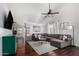 Cozy living room boasts a high ceiling, stylish decor, hardwood floors, and comfortable seating at 960 W Hudson Way, Gilbert, AZ 85233